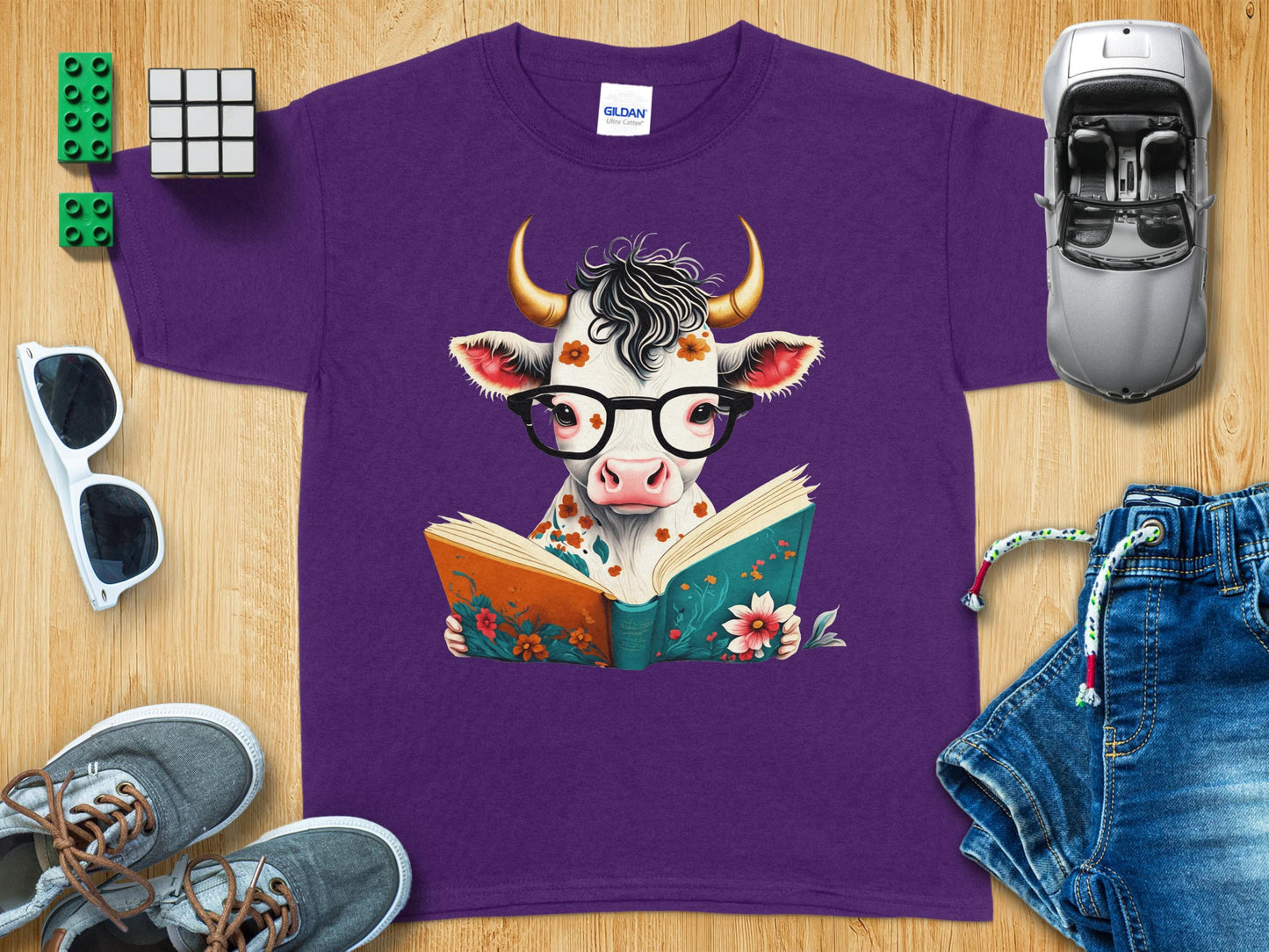 Playful Reading Cow Graphic Kids T-Shirt product
